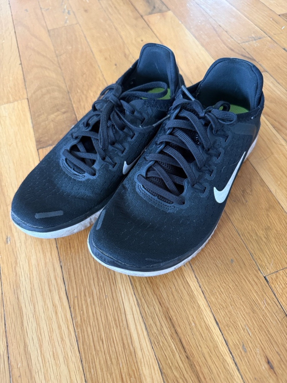 Nike Black Athletic Sneakers with White Swoosh